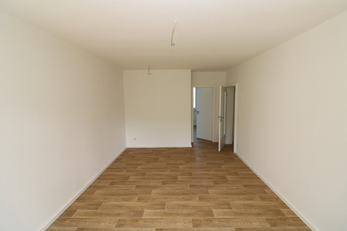 Die heißen Tage können kommen...2-RW mit ebenerdiger Dusche & Balkon!!! - Wohnzimmer